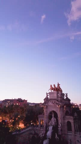 Aerial view of parc de la ciutadella fountain in barcelona at sunset