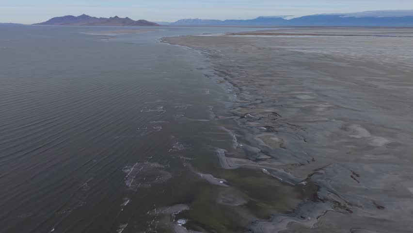 Aerial view of Great Salt Lake shoreline and Antelope Island in Utah