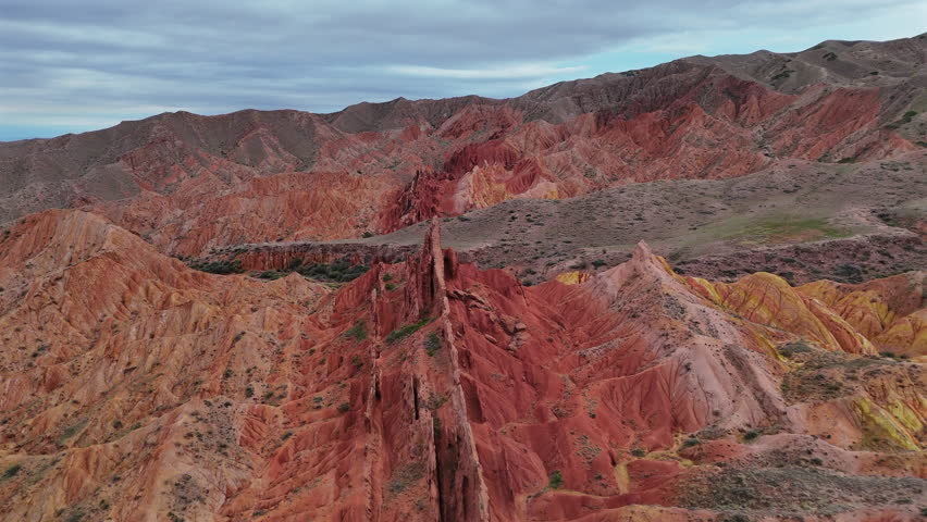 Red Sandstone Ridges in Colorful Canyon Aerial View