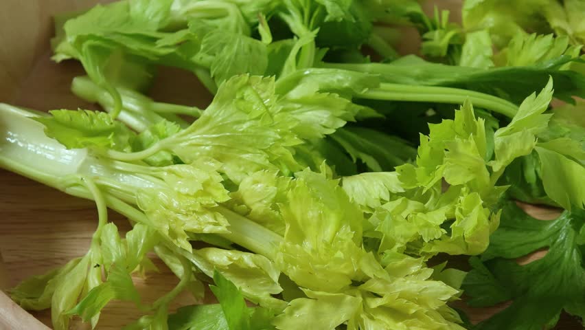 Fresh celery in a basket	