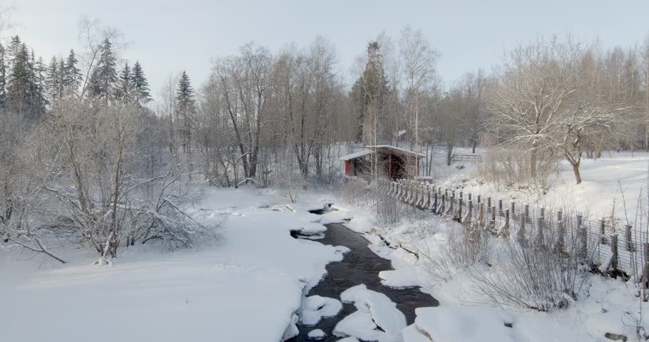 Winter landscape at Hanabölen rapids in sunny weather, Vantaa, Finland, Europe.