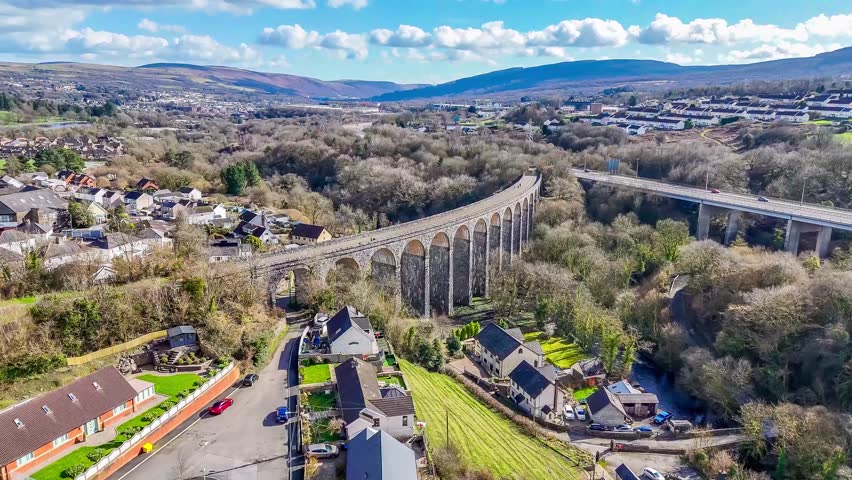 A aerial view banking from side to side flying towards the Cefn Coed Viaduct at Merthyr Tydfil, Wales, UK