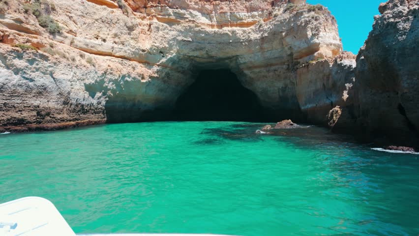 Benagil Caves in Algarve, Portugal on sunny day