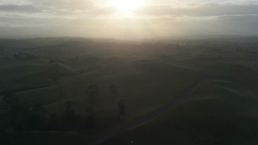 Drone aerial over the shire Hobbiton outside of Auckland New Zealand at sunrise