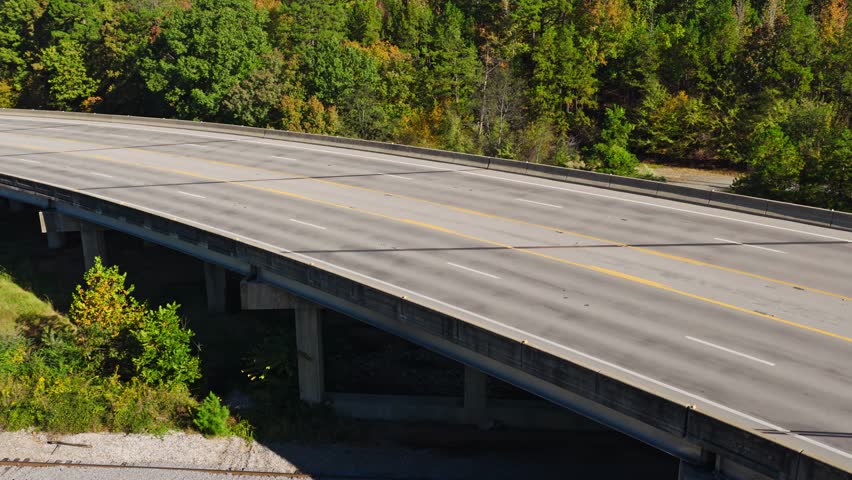 Highway Bridge Passing Over A Wooded Area In Arkansas, USA - Drone Shot
