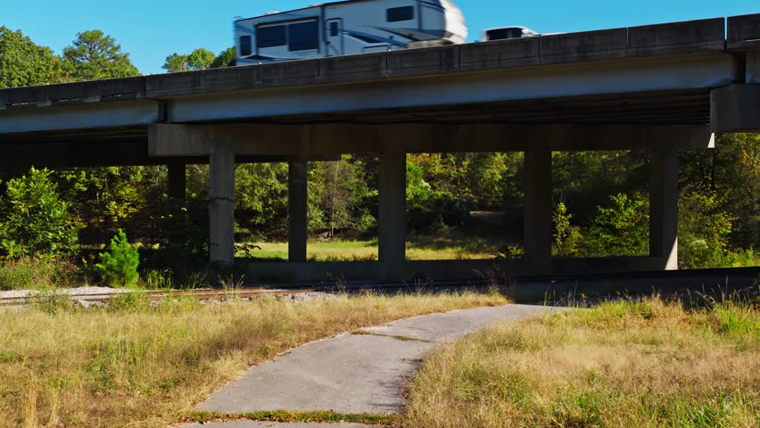 Highway Bridge Structure Spanning A Wooded Area In Arkansas, USA - Drone Ascending