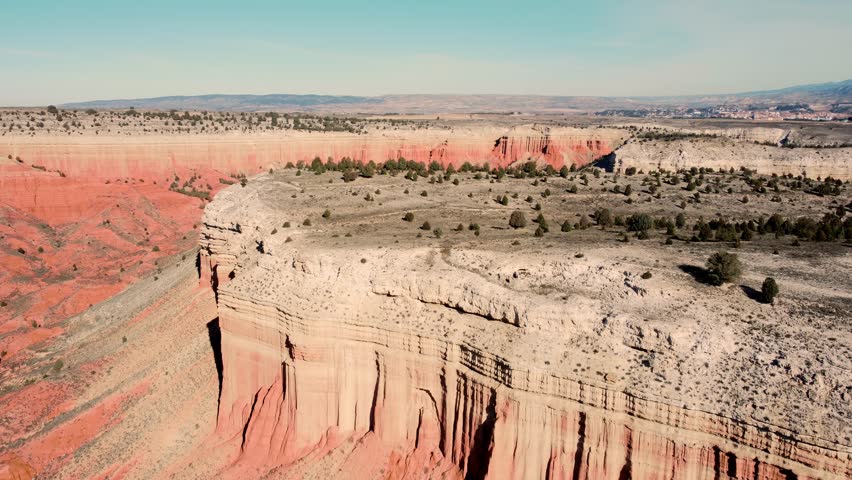 Drone aerial view of red desert canyon erosion formations, Teruel, Spain