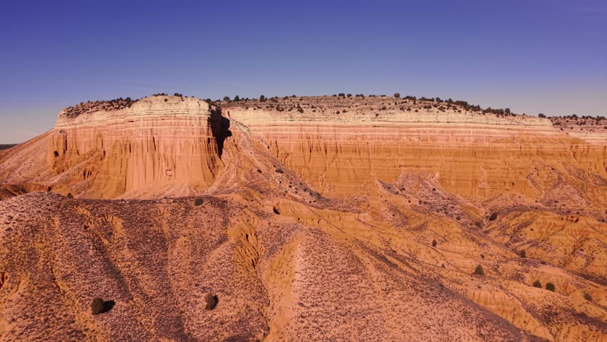 Drone aerial view of red desert canyon erosion formations, Teruel, Spain
