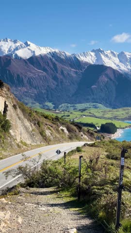 Scenic drive along Lake Hawea Highway with mountains in New Zealand