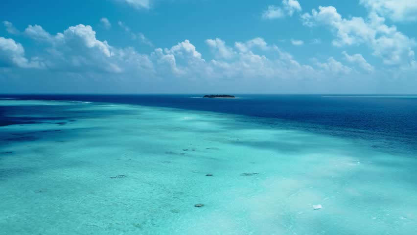 Clouds On The Blue Sky Over The Maldives Island View