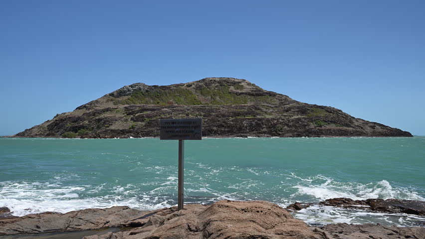 you are standing at the northernmost point of the australian continent sign at the tip of Cape York along the coastline of the torres strait in tropical north Queensland, Australia.