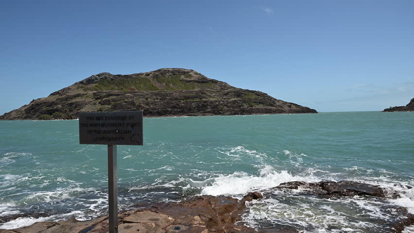 you are standing at the northernmost point of the australian continent sign at the tip of Cape York along the coastline of the torres strait in tropical north Queensland, Australia.
