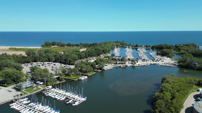 Aerial View of a Toronto Area Lake Ontario Sailing Marina with Sandy Beach and Deep Blue Water