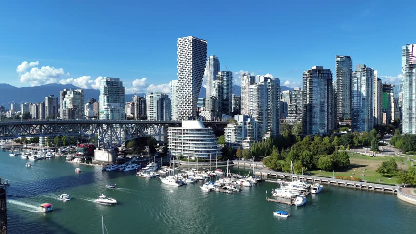 Stunning Aerial View of Vancouver Skyline and Bridge, Ferries and North Shore Mountains