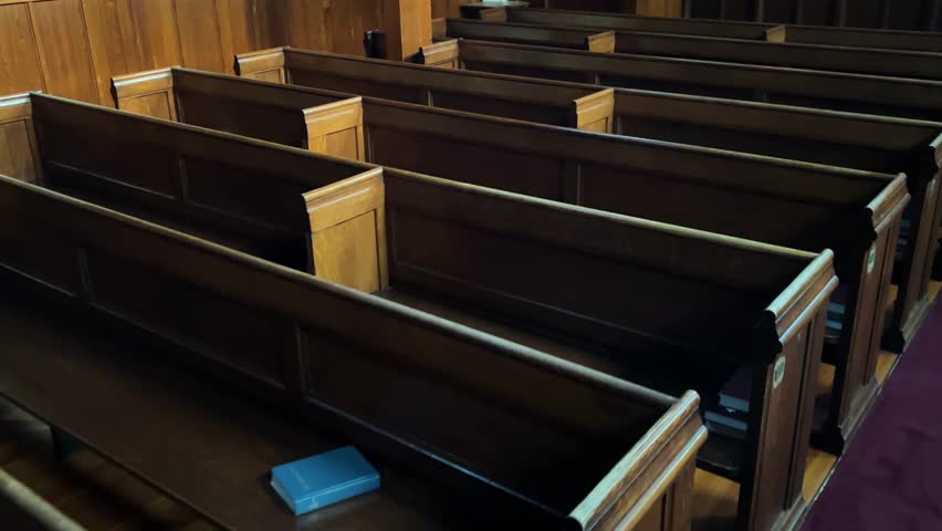 Overhead view of church pews showing rows of wooden seating in the sanctuary