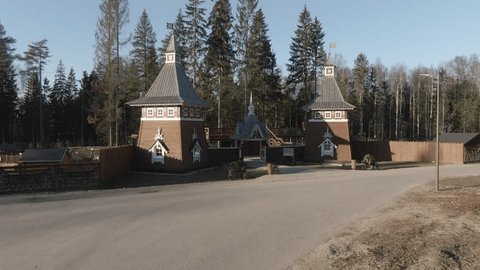 Drone Flying Forward above Wooden Fortress Gate