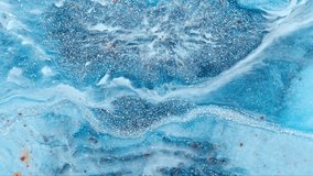 Abstract Blue Marble Resin Texture With Sparkling Glitter and Fluid Paint Swirls for Backgrounds - Powered by Shutterstock - Get 15% off with code: PIKWIZARD15