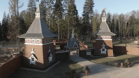 Upward Circular Drone Flight over Fortress Entrance