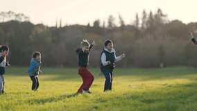 Happy children dancing and playing in a sunny park - Powered by Shutterstock - Get 15% off with code: PIKWIZARD15