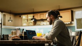 Man content creator and video editor using laptop to edit video clips and footage in timeline editing interface, highlighting videography with color grading and cinematic composition. Remote work. - Powered by Shutterstock - Get 15% off with code: PIKWIZARD15