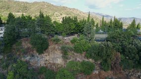 Cinematic aerial drone panorama of Alcantara Gorges in Sicily showing the dramatic lava canyon carved by the Alcantara River with basalt rock formations and crystal clear water flowing through a unique volcanic landscape near Mount Etna
 - Powered by Shutterstock - Get 15% off with code: PIKWIZARD15