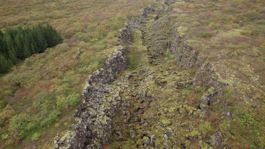 Hrafnagja Basalt canyon in central Iceland, tectonic plates meeting, fault line, Aerial push in
