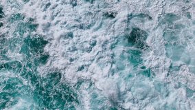 Natural ocean background with intense wave movement and sea foam, top down view - Powered by Shutterstock - Get 15% off with code: PIKWIZARD15