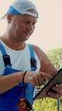 Attractive Construction worker makes notes in tablet. service man installing window - Powered by Shutterstock - Get 15% off with code: PIKWIZARD15
