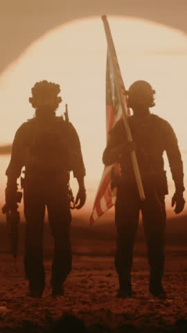 Vertical Screen: Special Forces Soldiers Stride Across a Middle East Desert at Sunset, Weapons Ready, Carrying the American Flag During a Modern Operation For Freedom and Peace. Cinematic Victory