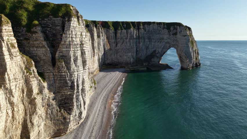 Etretat France chalk cliffs natural arch and pebble beach
