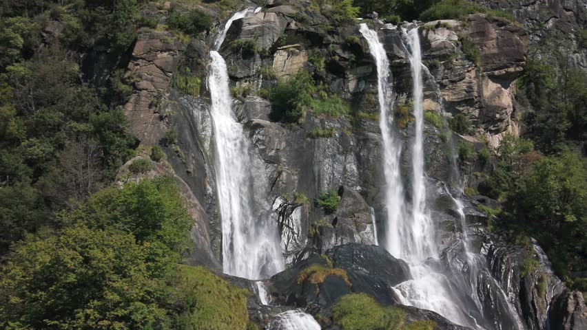 Powerful Acquafraggia waterfalls cascading over rocks in Val Bregaglia, Lombardy, Italy. Aerial