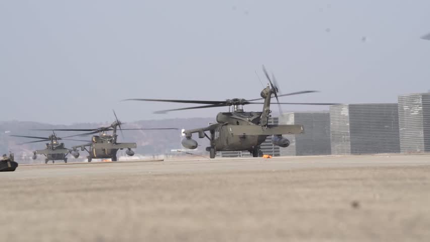 Video footage of a U.S. Army UH-60 BlackHawk helicopter moving on a runway.