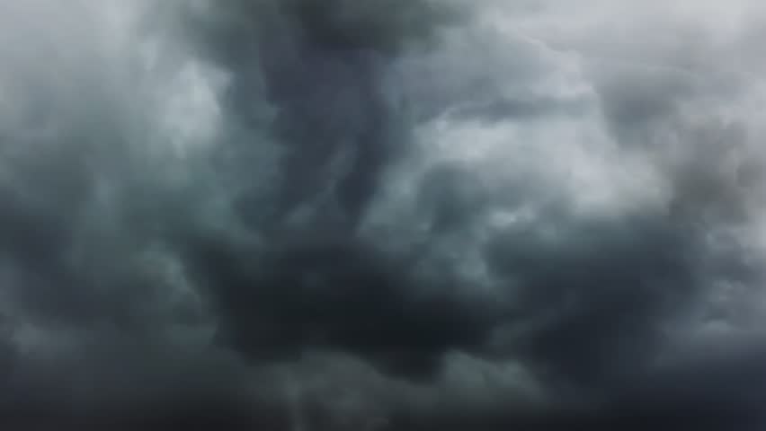 Dark storm clouds with heavy lightning strike effect in sky.