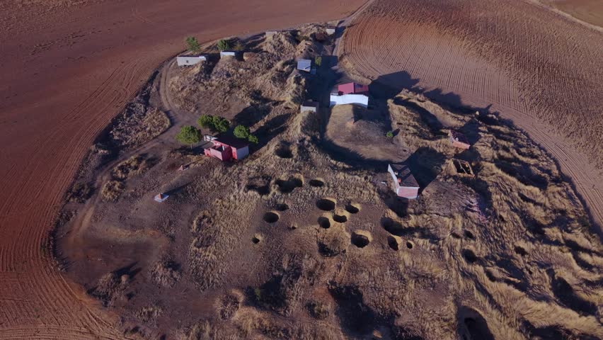 Aerial drone view of the wineries in the village of Las Cabañas de Castilla in the Tierra de Campos region. Palencia, Castile and León, Spain, Europe
