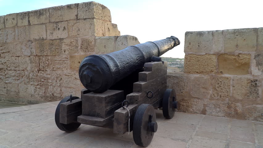 A vintage cannon standing on the medieval Citadel of Victoria in Gozo, Malta
