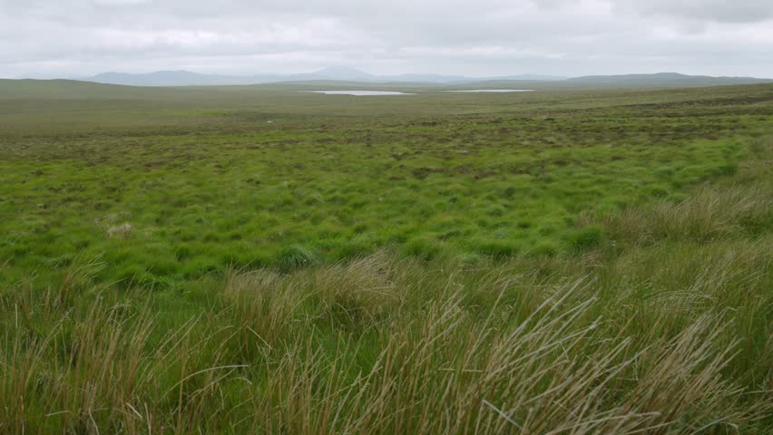 Static shot of a barren moorland landscape on the Isle of Lewis.