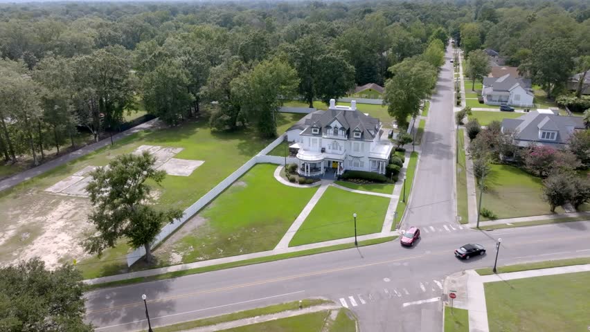Large historic home in Hattiesburg, Mississippi with stable drone video.