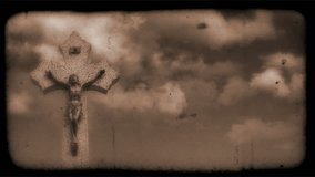 Vintage Film of crucifix with Clouds moving in the background