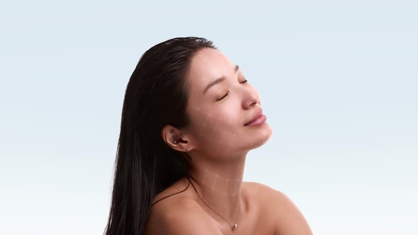 Relaxed woman with closed eyes and soft skin grid mapping on light background. Concept of wellness skincare, spa treatment, anti aging results and calm healthy lifestyle.