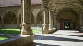 Cloister courtyard corridor with arched colonnade, soft defocused bokeh background outdoor; background backplate copyspace calm. - Powered by Shutterstock - Get 15% off with code: PIKWIZARD15