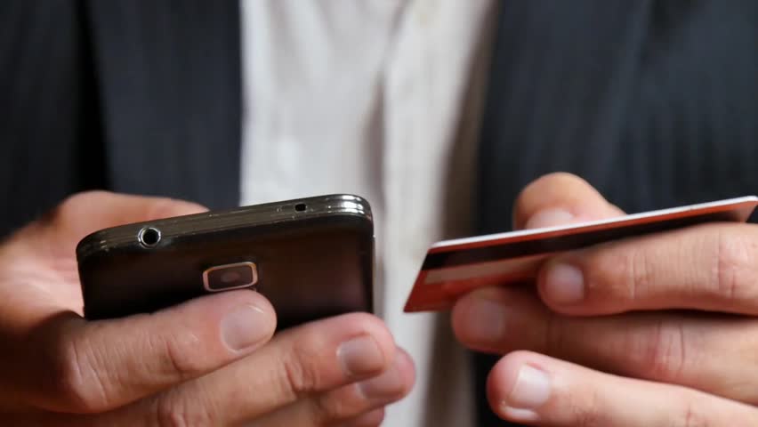 Close up of online payment using credit card for secure digital transactions. Ideal for e commerce, fintech, online banking, and cybersecurity concepts.
