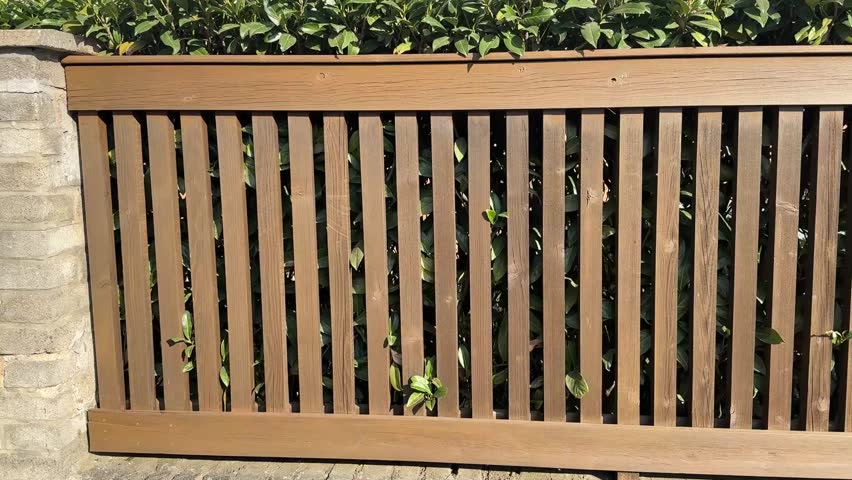 Wooden fence in front of the house