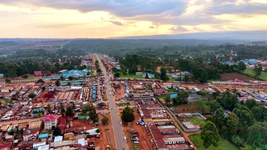 Rural cityscape kenya city skyline. Rural village of kenya. Aerial drone rural towns of kenya- slums . Sunset view of the small village in kenya. Roads of kenya.