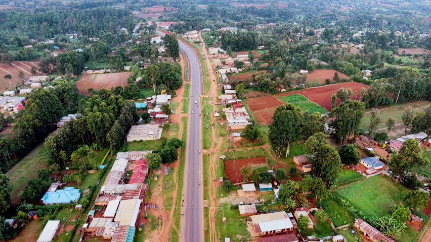 Rural cityscape kenya city skyline. Rural village of kenya. Aerial drone rural towns of kenya- slums . Sunset view of the small village in kenya. Roads of kenya.