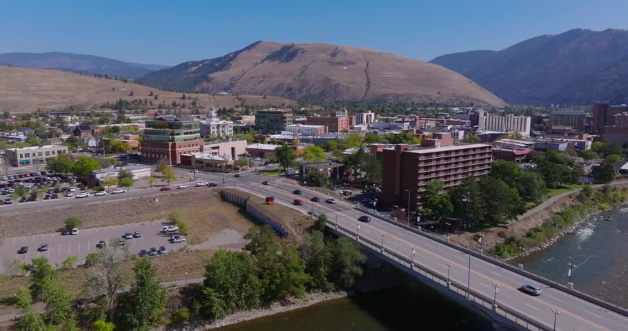 Aerial of bridge and downtown Missoula Montana by Clark Fork River