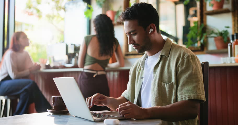 Video call, laptop and freelancer with man in cafe for online meeting, hello or communication. Virtual advisor, remote work and entrepreneur with person in coffee shop for discussion, wave or webinar