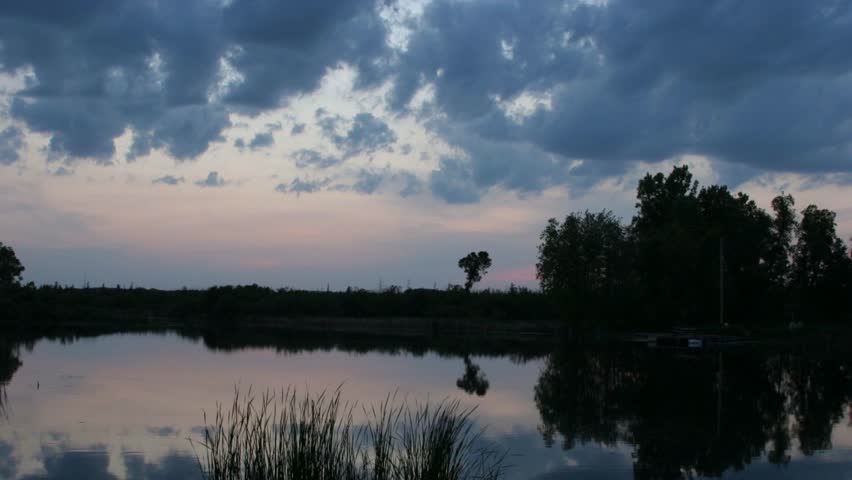 Peaceful Marsh at Sunset with calm water