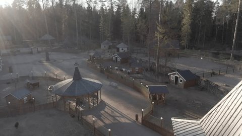 Drone Descending toward Goat Enclosure