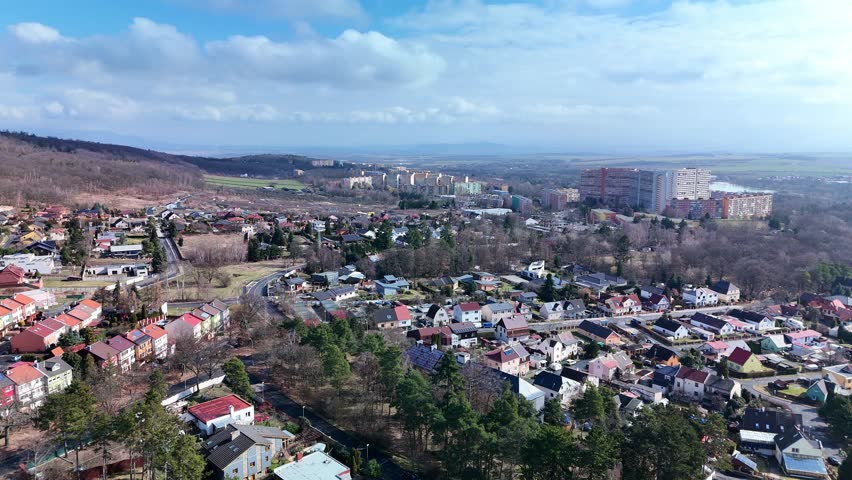 Drone View of Small Town with Hills and Residential Area