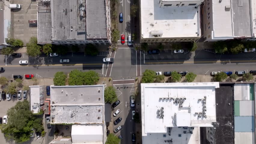 Downtown intersection of traffic in Hattiesburg, Mississippi with drone video overhead.